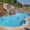 Ledgestone waterfall, Slide, Caribbean blue quartz plaster